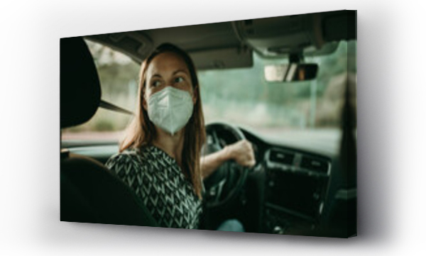 Wizualizacja Obrazu : #366159370 Mid adult woman with protective mask in car