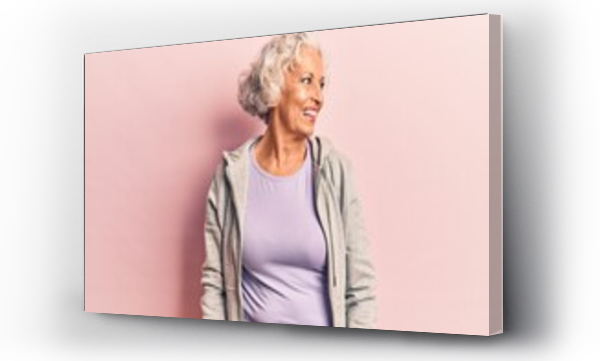 Wizualizacja Obrazu : #370445563 Senior grey-haired woman wearing casual sporty clothes looking away to side with smile on face, natural expression. laughing confident.
