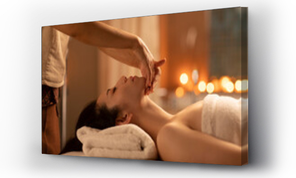 Wizualizacja Obrazu : #401389894 Young woman receiving facial massage at spa center