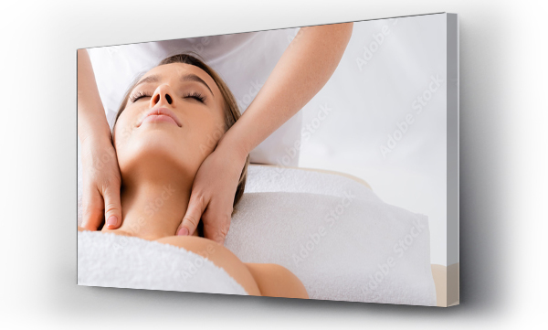 Wizualizacja Obrazu : #410382860 Masseur doing neck massage to client with closed eyes in spa salon, banner