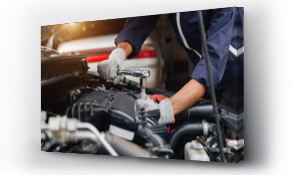 Wizualizacja Obrazu : #431285978 Automobile mechanic repairman hands repairing a car engine automotive workshop with a wrench, car service and maintenance,Repair service.