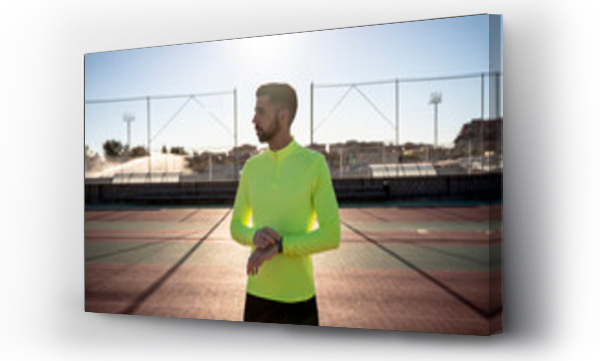 Wizualizacja Obrazu : #431951342 Male sportsperson at sports court looking away