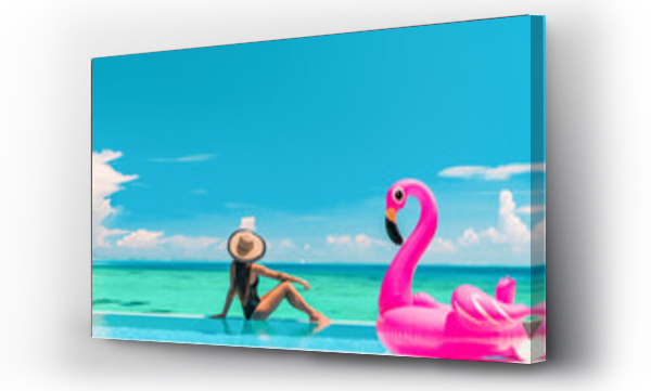 Wizualizacja Obrazu : #433153545 Vacation summer fun woman sunbathing with inflatable pink flamingo pool float by infinity swimming pool. Luxury travel holiday at overwater villa resort.