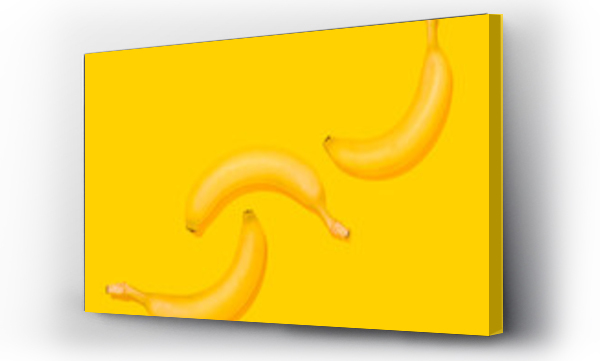 Wizualizacja Obrazu : #440152028 Ujęcie studyjne trzech bananów leżących na żółtym tle