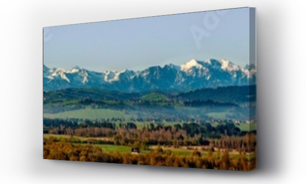 Wizualizacja Obrazu : #440706455 Extra wide panorama of the Tatra Mountains with forests, hills and meadows in Podhale region in Poland. Early morning in spring, morning fog, sunrise light