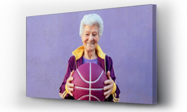 Wizualizacja Obrazu : #441400954 Senior sportswoman with basketball on purple background
