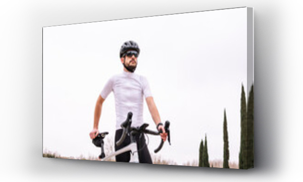 Wizualizacja Obrazu : #442739377 Bearded biker in sunglasses with bicycle under white sky