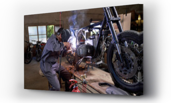 Wizualizacja Obrazu : #443110234 Anonymous mechanic welding parts of motorcycle