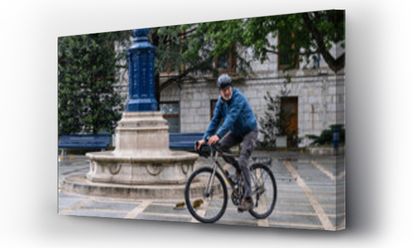 Wizualizacja Obrazu : #443928067 man on bike in city square