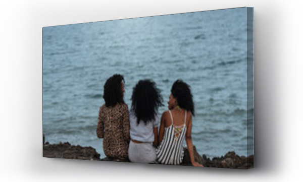Wizualizacja Obrazu : #448874520 Three sisters sitting in a cliff seashore