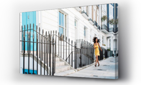 Wizualizacja Obrazu : #448888475 Woman walking happy by beautiful white houses facades