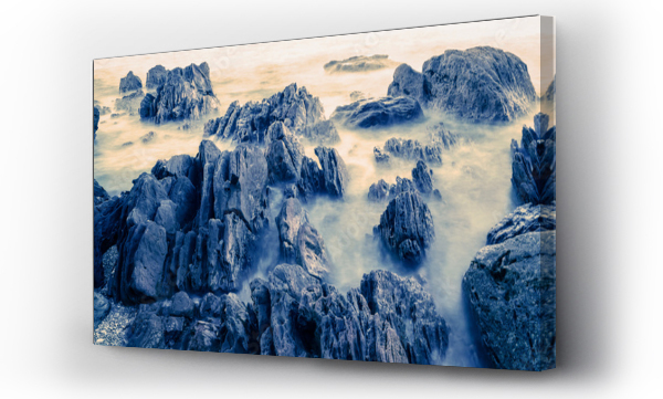 Wizualizacja Obrazu : #452022783 Misty waves rolling in around rocks on rocky beach