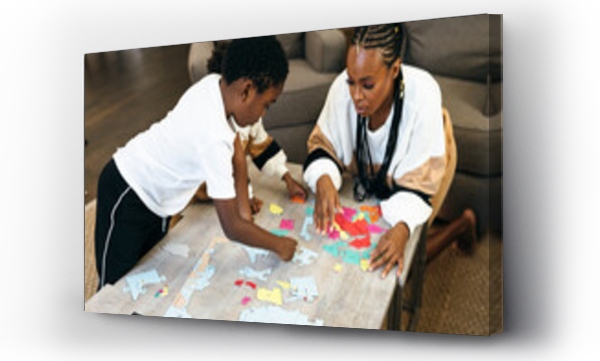 Wizualizacja Obrazu : #453217617 Black mother and kids put together africa puzzle 