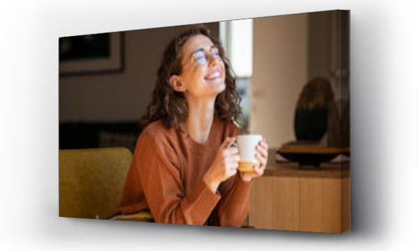 Wizualizacja Obrazu : #457504109 Cheerful woman enjoying coffee cup in a winter afternoon