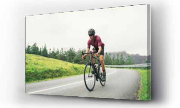 Wizualizacja Obrazu : #458284750 Bicyclist riding bike during training on countryside road