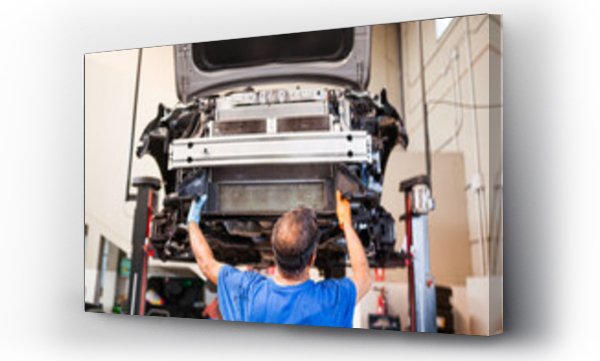 Wizualizacja Obrazu : #459710800 Mechanic repairing car in workshop