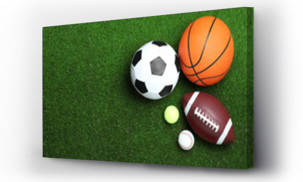 Wizualizacja Obrazu : #469113074 Set of different sport balls on green grass, flat lay. Space for text