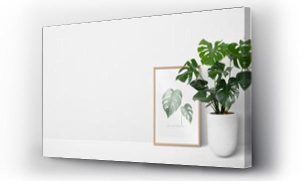 Wizualizacja Obrazu : #472531904 Picture frame leaning against a white wall