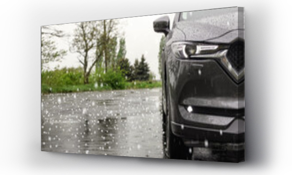 Wizualizacja Obrazu : #476322394 Modern car parked outdoors on rainy day with hail