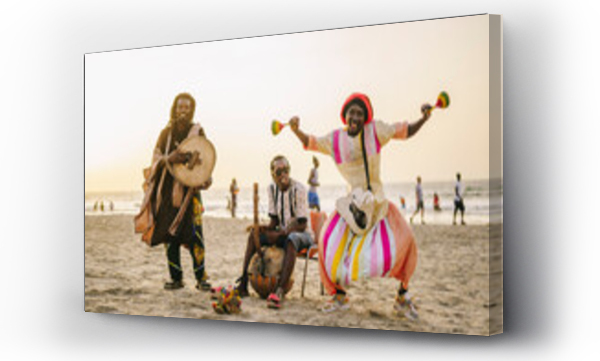 Wizualizacja Obrazu : #486603273 Traditional African group playing music on shore