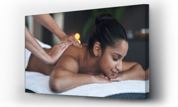 Wizualizacja Obrazu : #492362586 The best days are spa days. Shot of a young woman getting a back massage at a spa.