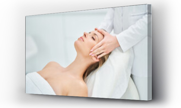Wizualizacja Obrazu : #503322944 Young nice woman having face massage in spa