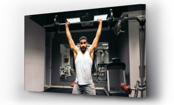 Wizualizacja Obrazu : #510135841 Man Doing Weightlifting Exercise In Gym