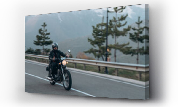Wizualizacja Obrazu : #518387588 Male biker driving motorcycle in highlands