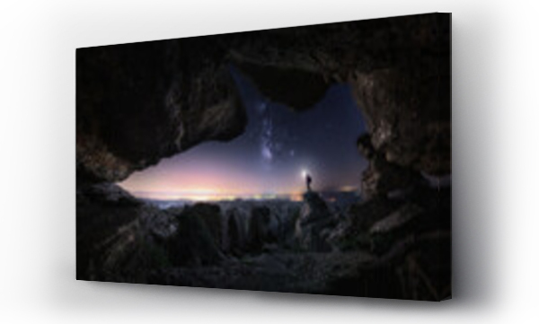 Wizualizacja Obrazu : #524809252 Unrecognizable traveler near cave at night