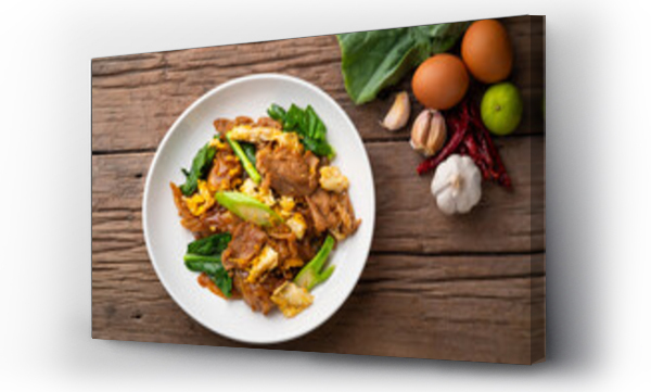 Wizualizacja Obrazu : #551287267 Stir-fried Rice Noodles with Soy Sauce and Pork,Pad See Ew.Top view