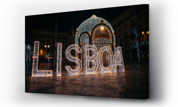 Wizualizacja Obrazu : #553563806 Christmas lights on a gazebo with a Lisboa sign lit up in a city square in Chiado and Bairro Alto districts; Lisbon, Estremadura, Portugal