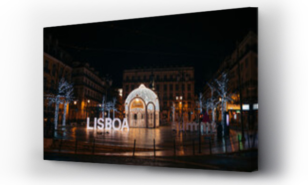 Wizualizacja Obrazu : #553563809 Christmas lights on a gazebo with a Lisboa sign lit up in a city square in Chiado and Bairro Alto districts; Lisbon, Estremadura, Portugal