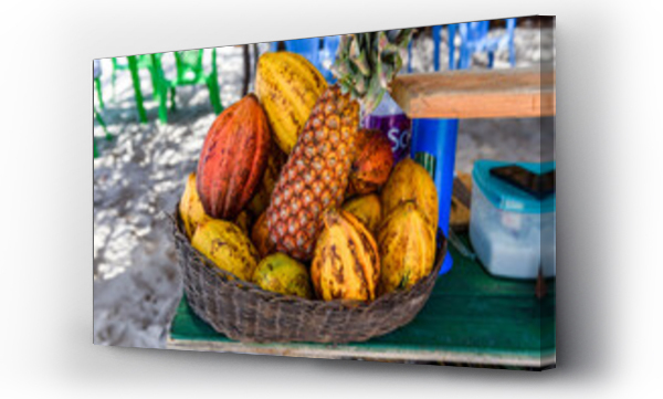 Wizualizacja Obrazu : #575256434 Tropical fruit basket on beach in south Bahia, Ilha de Boipeba, Brazil