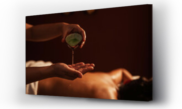 Wizualizacja Obrazu : #590776177 Masseur pouring aroma oil on hand, for massage on back of customer. Relaxation young male customer get service aromatherapy massage with masseuse in spa salon.