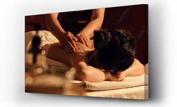 Wizualizacja Obrazu : #590776291 Relaxation woman back massage with masseur in cosmetology spa centre.