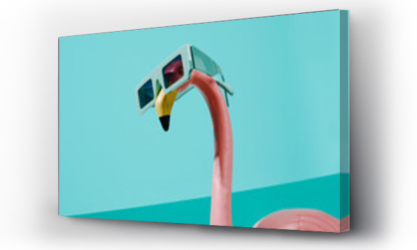Wizualizacja Obrazu : #612660248 fake pink flamingo wearing a pair of sunglasses