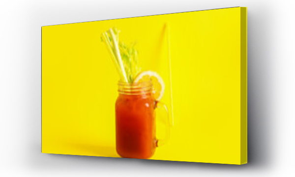 Wizualizacja Obrazu : #615929811 Mason jar of bloody mary with celery and lemon on yellow background