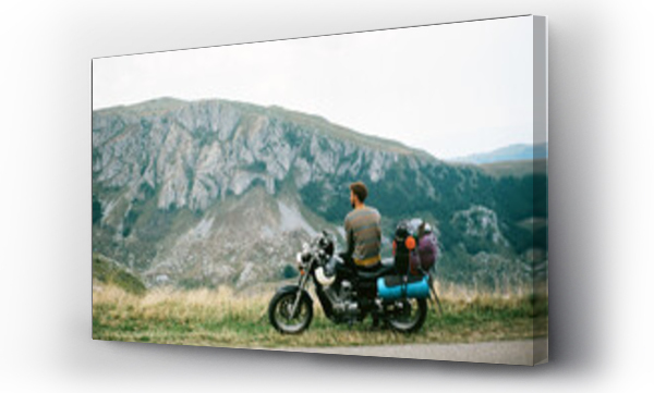 Wizualizacja Obrazu : #620650688 Man on a motorcycle in mountains of Montenegro