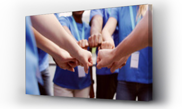 Wizualizacja Obrazu : #623866781 Volunteer Charity Team Joining Hands Together