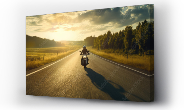 Wizualizacja Obrazu : #626770022 Driver riding motocycle on empty road in sunset light.  Panorama photo.