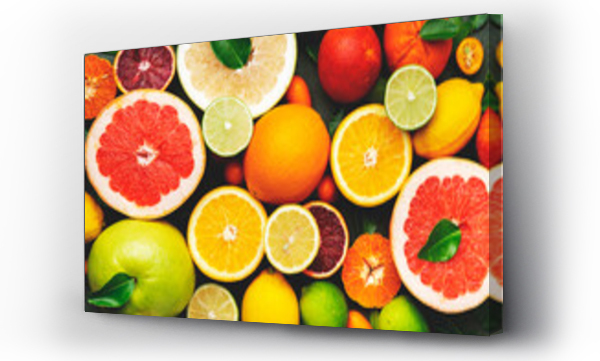 Wizualizacja Obrazu : #628825750 Colorful citrus fruis, food background, top view. Mix of different whole and sliced fruits: orange, grapefruit, lemon, lime and other with leaves on  green stone table