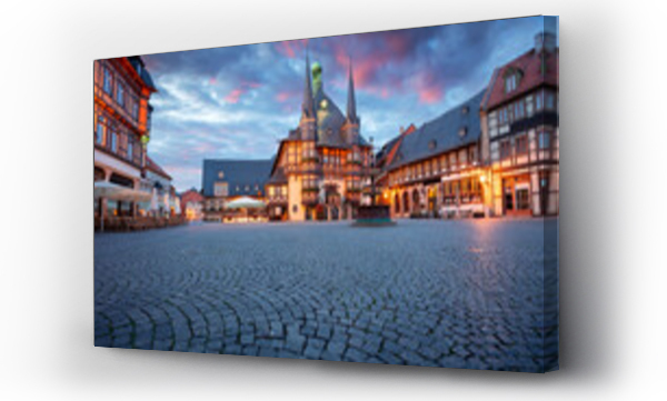 Wizualizacja Obrazu : #646376146 Wernigerode, Germany. Cityscape image of historical downtown of Wernigerode, Germany with Old Town Hall at summer sunrise.