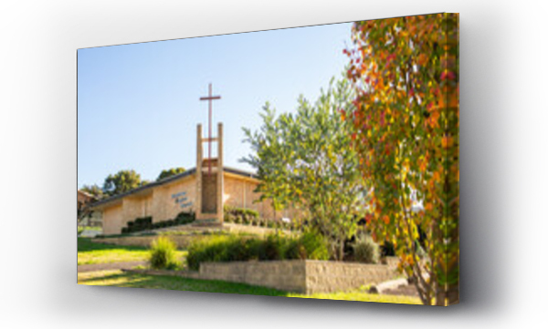 Wizualizacja Obrazu : #646822234 Christian church building with bright autumn colours on tree and wattle bush