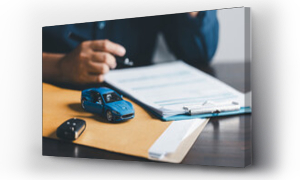 Wizualizacja Obrazu : #648713134 Businesswoman signing car insurance document or lease paper. Writing signature on contract or agreement. Buying or selling new or used vehicle. Car keys on table. Warranty or guarantee.