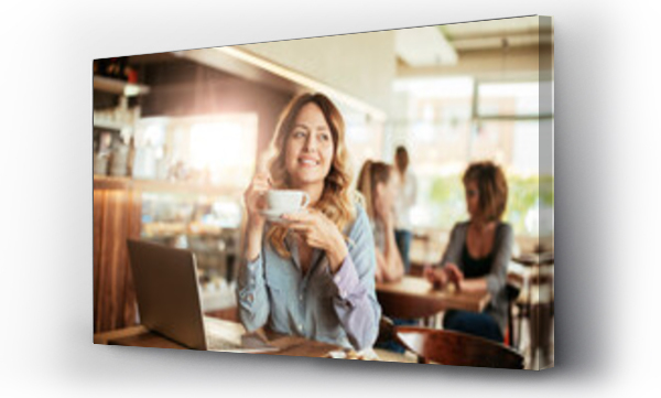 Wizualizacja Obrazu : #653403519 Young Caucasian woman enjoying a cup of coffee alone in a cafe or bar