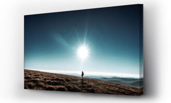Wizualizacja Obrazu : #656073163 Woman stands on horizon hills with big shinning sun above her head, Krkonose, Czech republic, minimalistic nature scene, blue beautiful skies