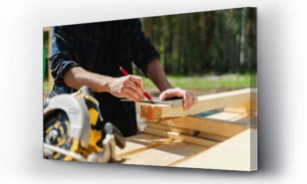Wizualizacja Obrazu : #659319447 Engineer measuring wood at construction site on sunny day