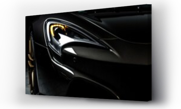 Wizualizacja Obrazu : #660856303 modern front view black car headlights on black background