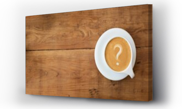 Wizualizacja Obrazu : #660860977 Top view of a cup of coffee with a question mark in the foam on a wooden table