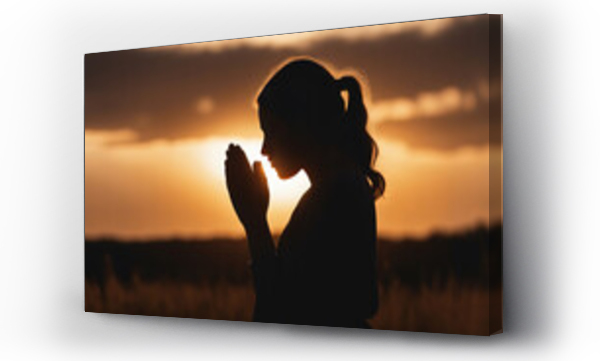 Wizualizacja Obrazu : #662148957 Silhouette of a praying girl with folded palms at sunset